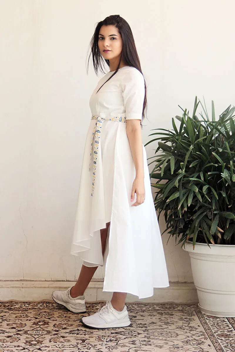 Asymmetric hem full flared cotton dress in White with a printed belt