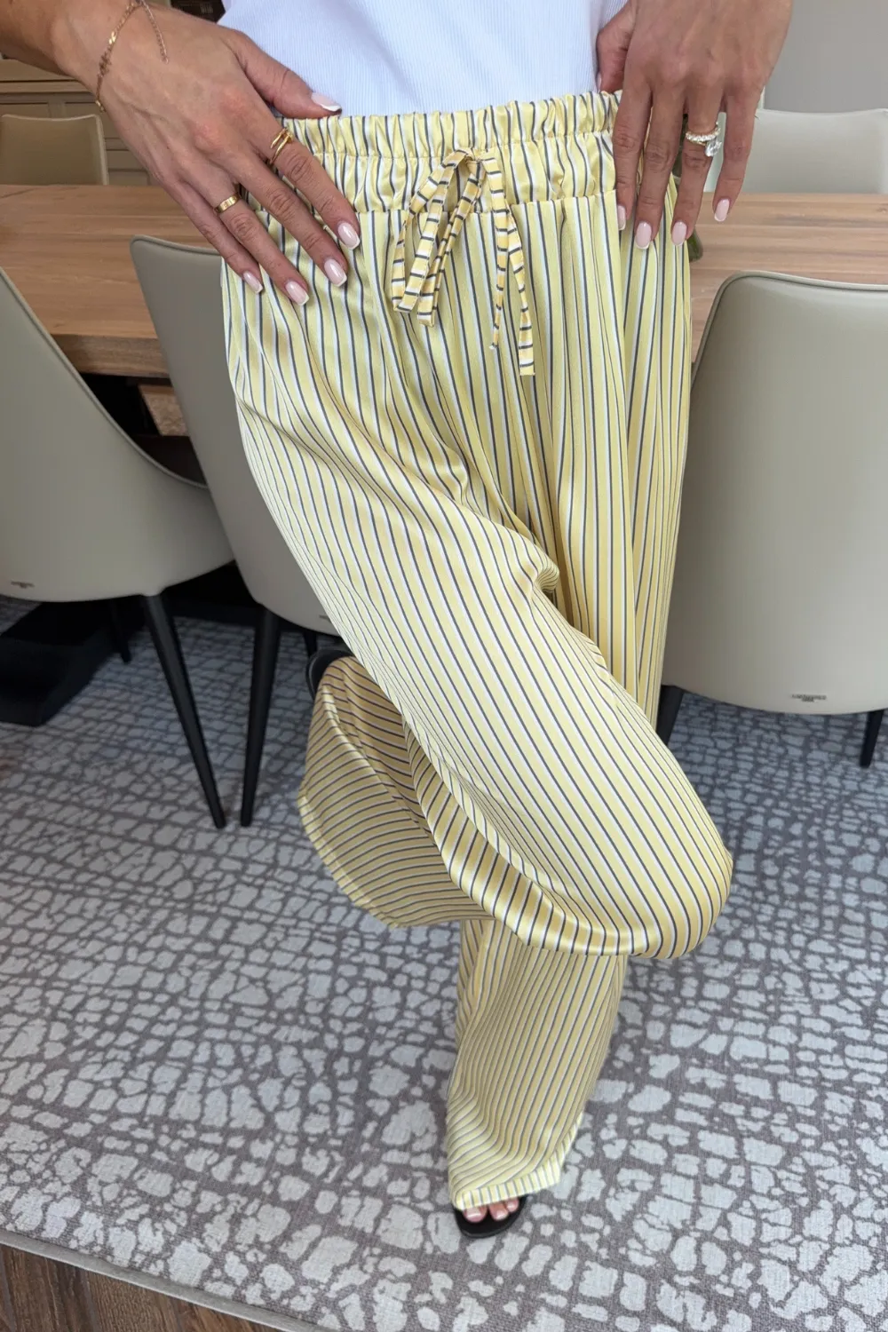 Charlotte lemon striped satin trousers